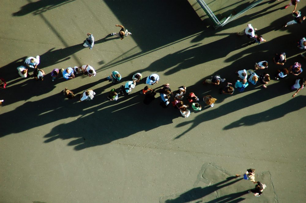 line of people outside from aerial view