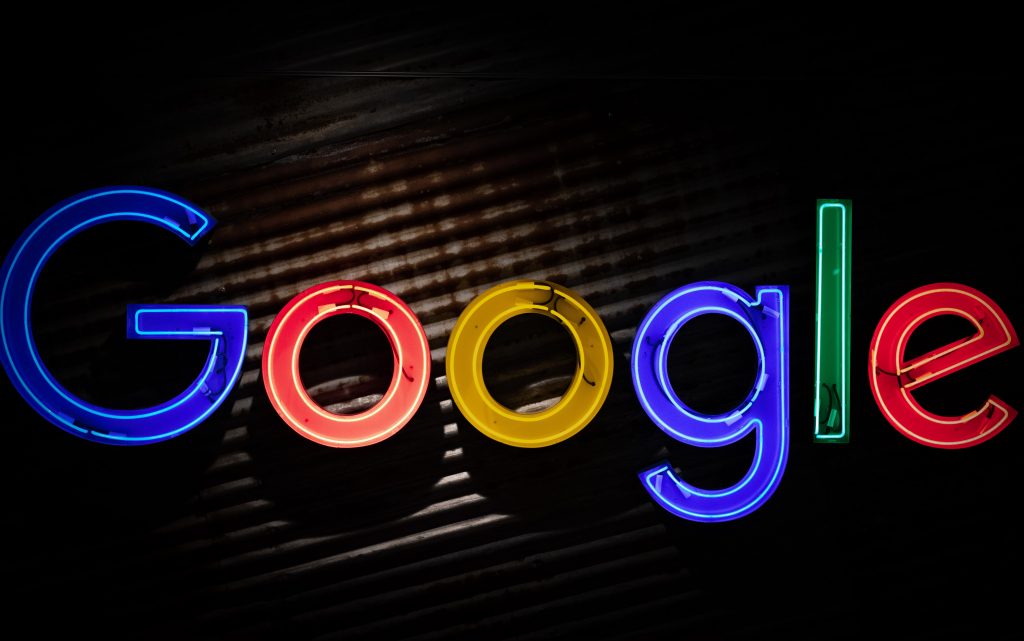 neon google logo in the dark