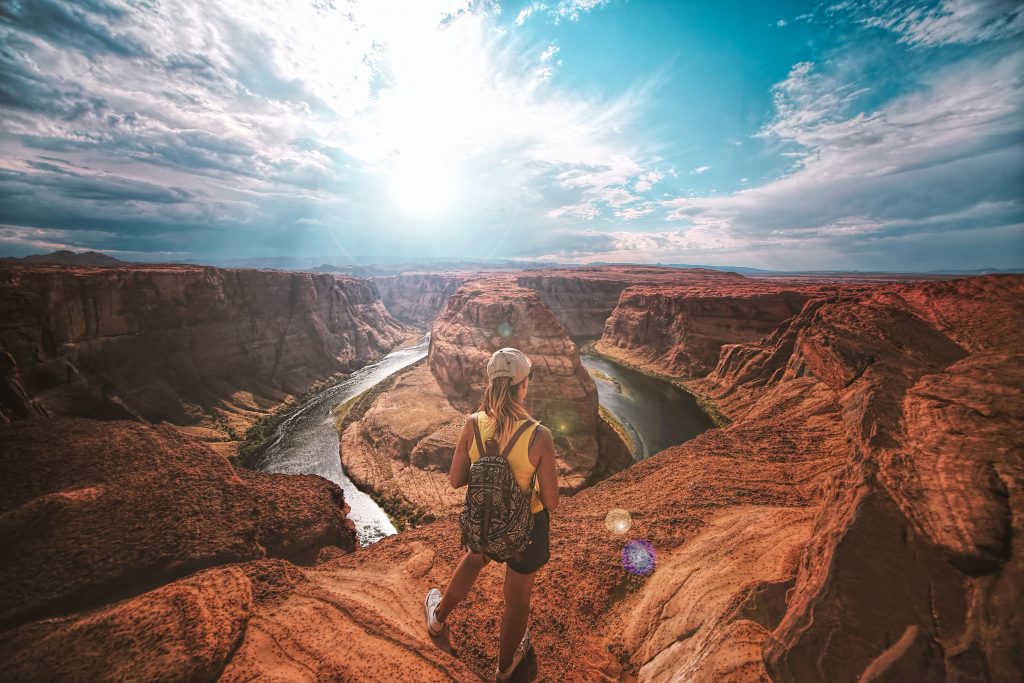 hiker girl looking over a canyon