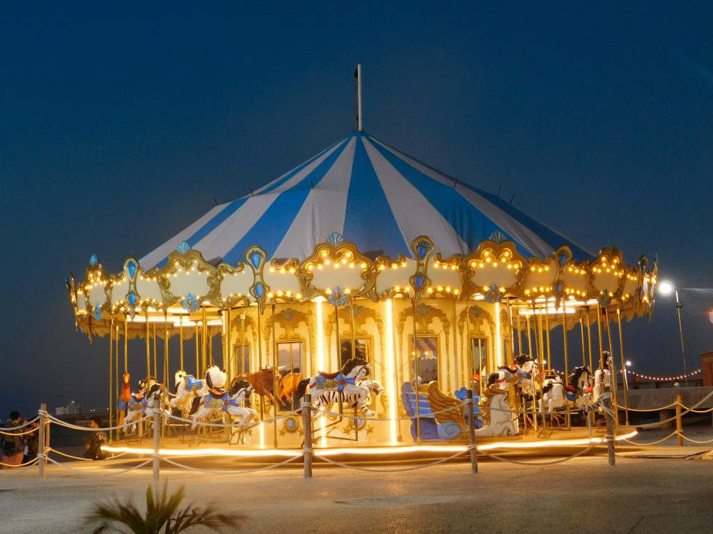 outdoor carousel lit up at night