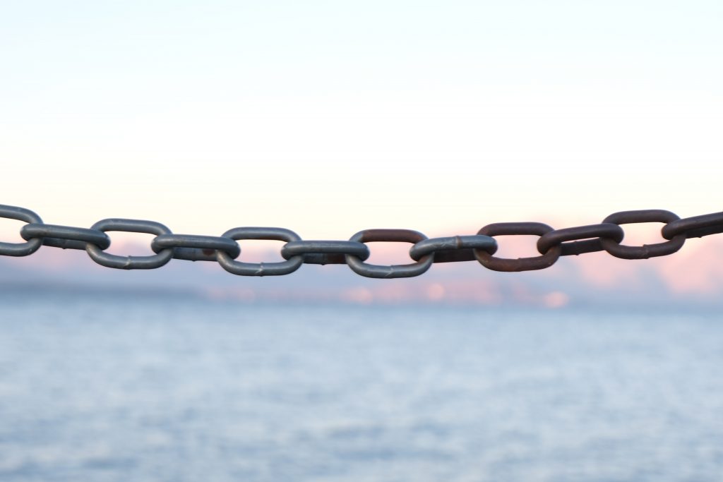 chain links by a river