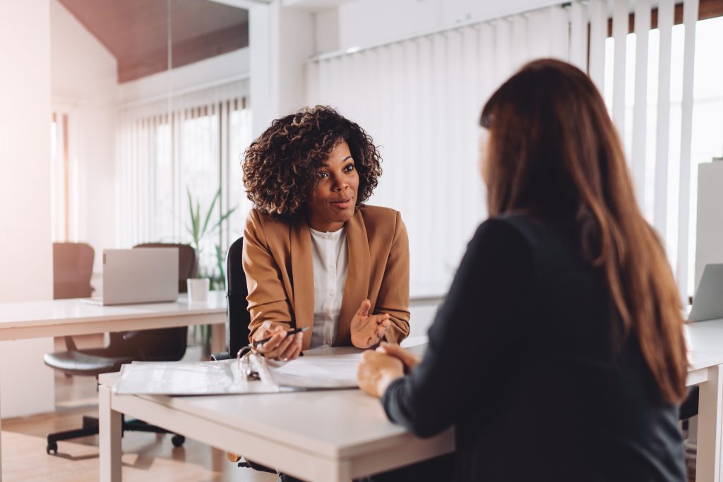 Young woman from a business doing an interview with a marketing professional