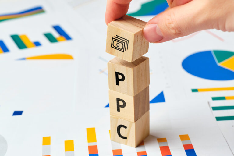 Pay per click PPC on wooden blocks with graphs